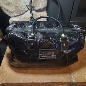 Black imitation snake travel/carry on bag